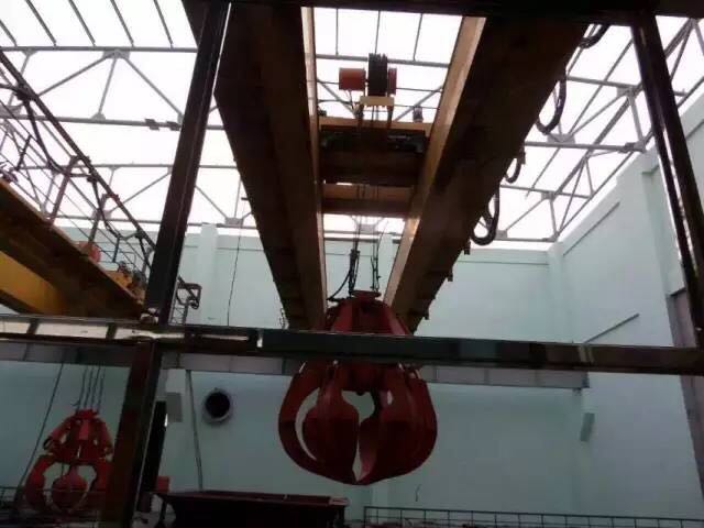 垃圾抓斗起重機(jī)自動投料的作用